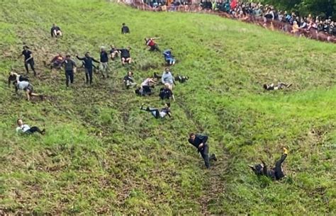 Whey to go! B.C. woman wins perilous cheese-rolling race despite being knocked unconscious | CBC ...