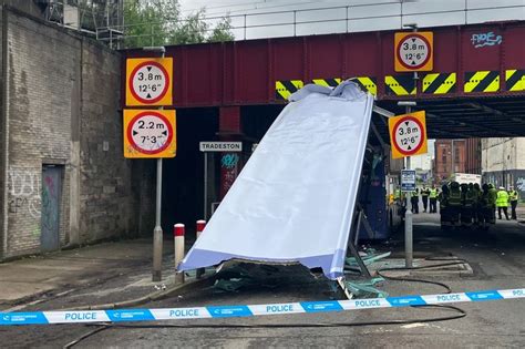 Bus Smashes Into Bridge Ripping Off Roof As 10 People Rushed To