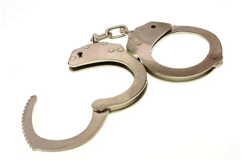 Premium Photo Metal Handcuffs Isolated On The White Background