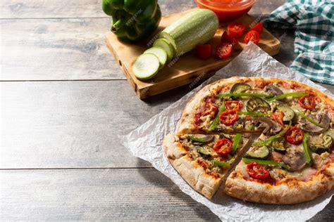 Premium Photo Vegetarian Pizza With Zucchini Tomato Peppers And Mushrooms