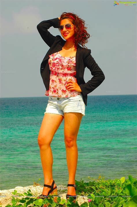 Stylish Parul Gulati Posing Hot At BeachHigh Resolution Posters Gallery Images