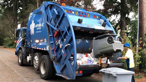 Republic Services Rear Loader Garbage Truck Jay Packing Trash In The