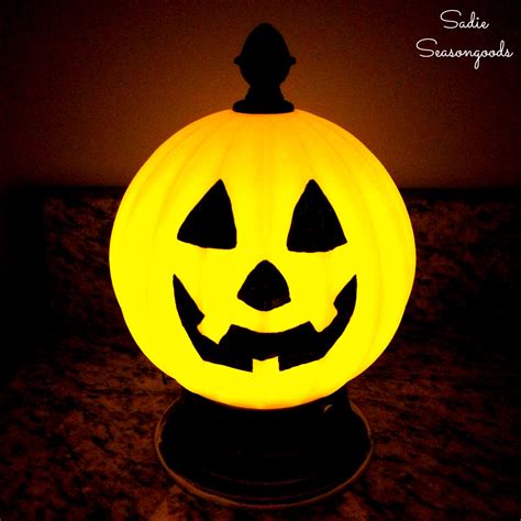 Light Up Pumpkin And Halloween Jack O Lantern From An Old Light Fixture