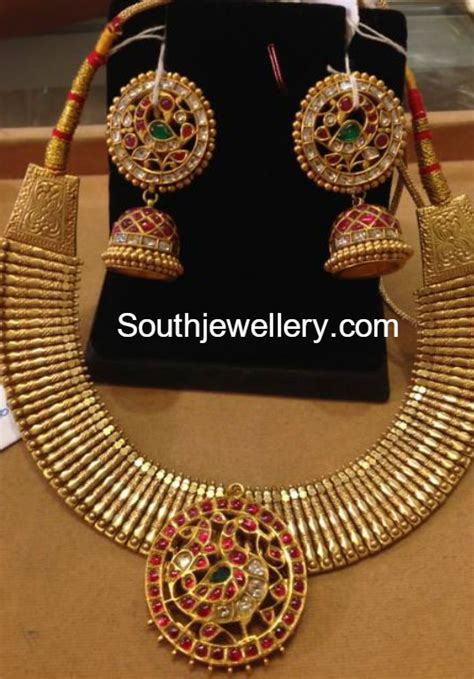 Antique Gold Necklace And Jhumkas Set Indian Jewellery Designs