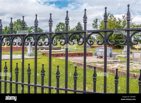 Black wrought iron fence hi-res stock photography and images - Alamy