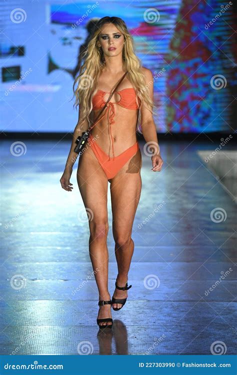 A Model Walks The Runway For Almost Naked Swim Show Editorial Image Image Of Catwalk Miami