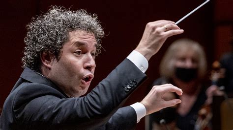 Los Angeles Philharmonic conductor Gustavo Dudamel conducts as María ...