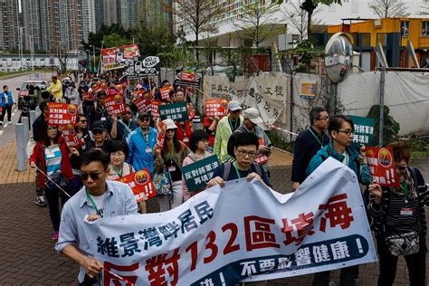 Hong Kong police keep tight tabs on first authorised protest in years ...