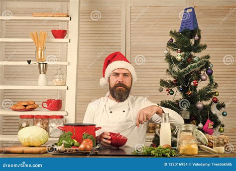 Chef Man In Santa Claus Hat Cooking Stock Photo Image Of Christmas