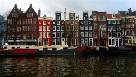 Explore The Fascinating History Behind Amsterdams Iconic Canal Houses