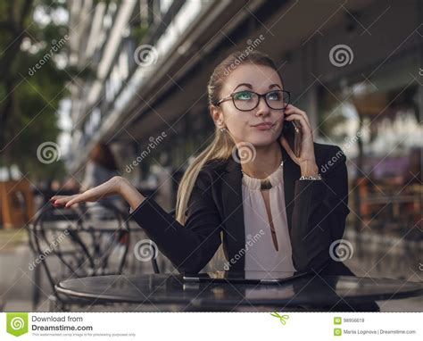 Business Woman Or Teacher Talking On The Cellphone Emotionally Stock