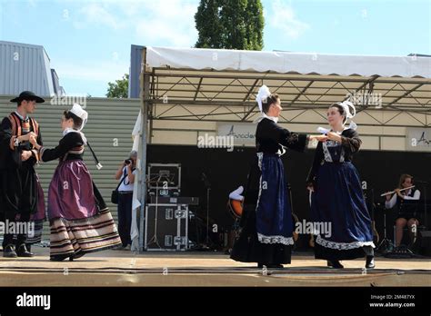 Breton Dancing In Traditional Costumes At Oyster Festival At Arradon