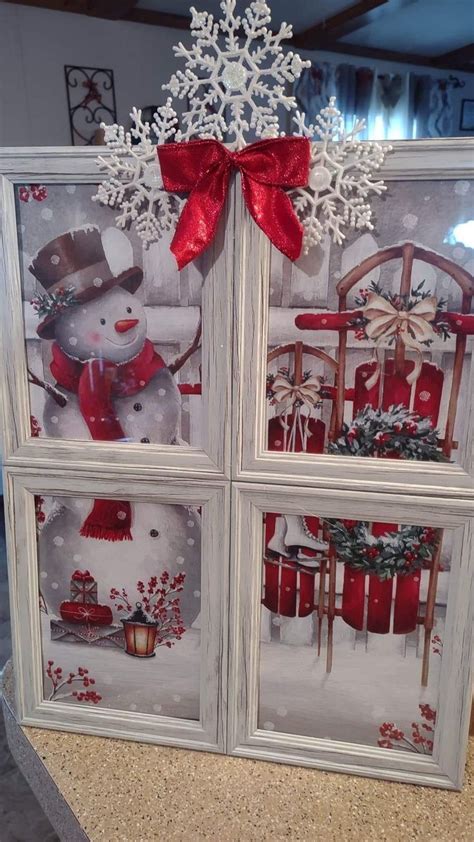 The Window Is Decorated With Snowmen And Christmas Decorations