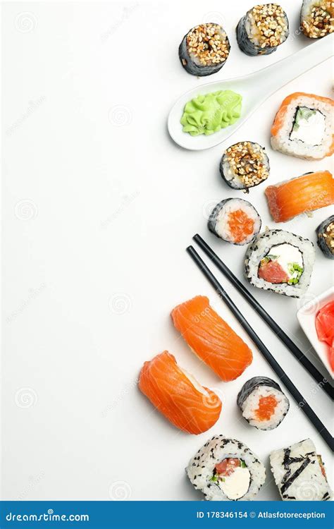 Sushi Rolls And Chopsticks On White Background Stock Photo Image Of