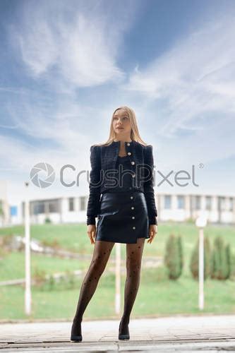 Full Length Portrait Of Confident Woman Stock Photo Crushpixel