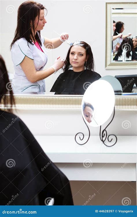 Hairdresser Applying Color Female Customer At Salon Doing Hair Dye