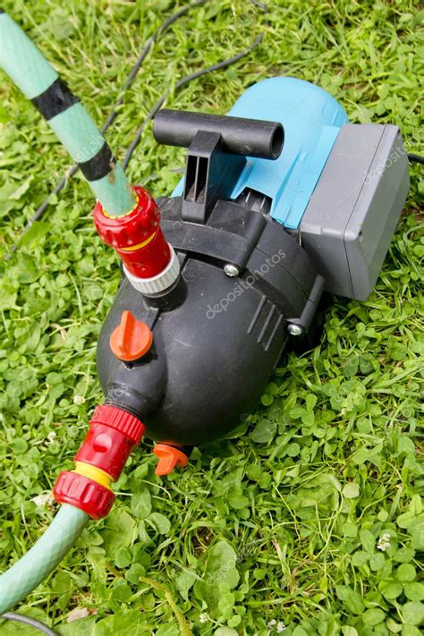 Garden hose and water pump connection — Stock Photo © kaparulin #11804458