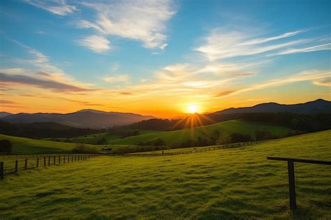 Beautiful Country View Of Pastureland With Grassy Hill And Sunset ...