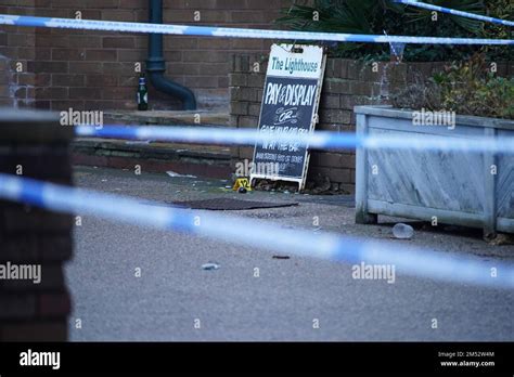 Crime Scene Tape And Evidence Markers At The Lighthouse Inn In Wallasey Village Near Liverpool