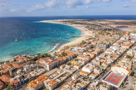 Pier And Boats On Turquoise Water In City Of Santa Maria Sal Cape