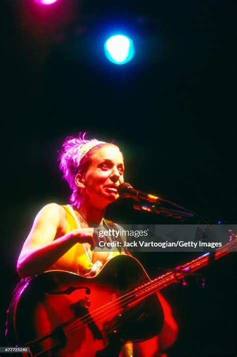 American Folk And Alternative Musician Ani Difranco Plays Guitar As