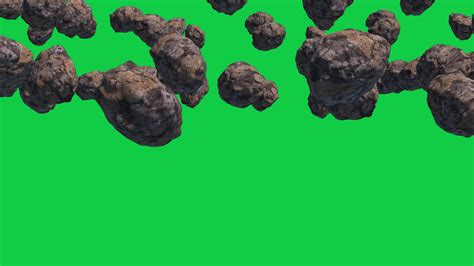 lot of asteroid rocks rolling and falling down animation on green ...