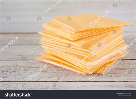 3,300 Processed Cheese Slices On Board Images, Stock Photos & Vectors ...