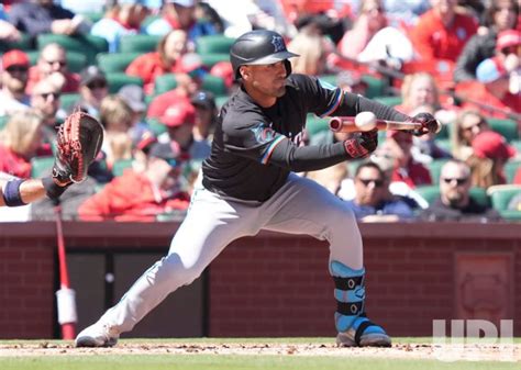 Photo: Miami Marlins Nick Fortes Lays Down Bunt - SLP2024040608 - UPI.com