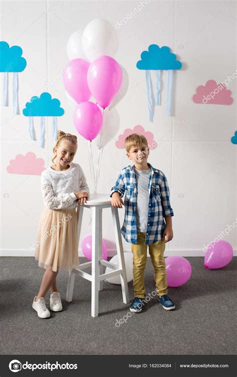 Kids with balloons at birthday party Stock Photo by ©AlexLipa 162034084