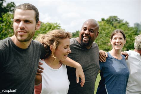 Group Of People Hugging Each Other In The Park Premium Image By