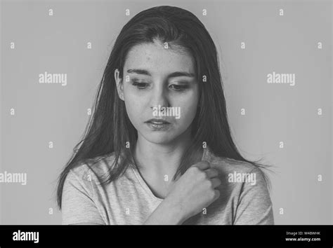 Black And White Portrait Of A Young Sad Woman Serious And Concerned