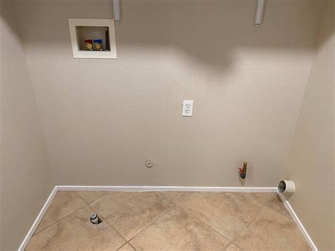 plumbing - Second floor washer drain pipe sticks out from the floor