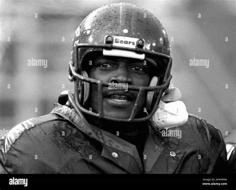 Chicago Bears running back Walter Payton is shown on the bench during a ...