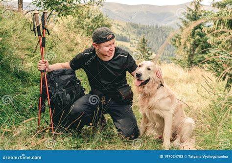 Man Hiking in Mountain with Dog Stock Image - Image of lifestyle ...