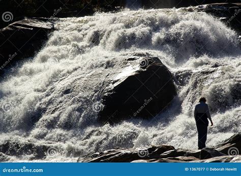 Person at waterfall stock image. Image of flow, thunderous - 1367077