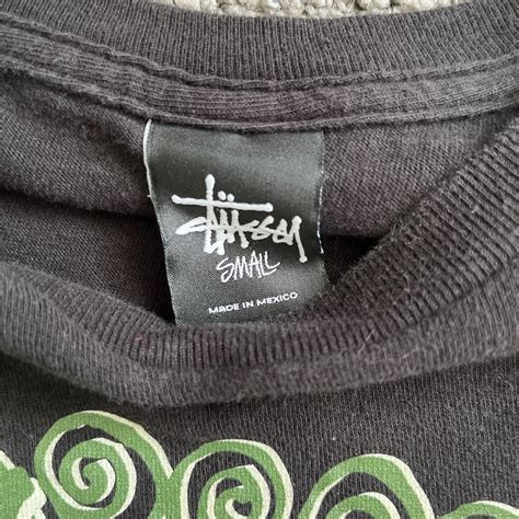 Stüssy Women's Black and Green Shirt | Depop