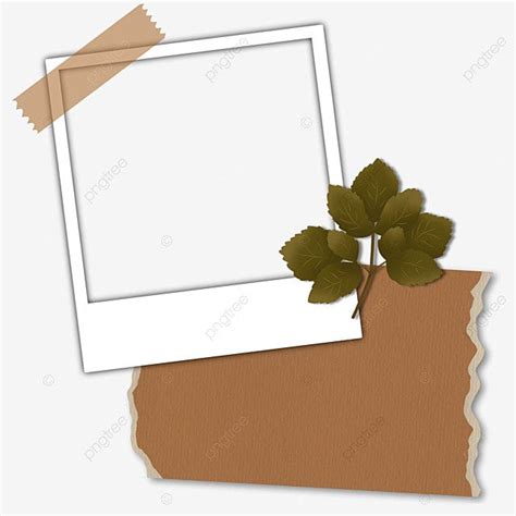 a piece of paper with leaves on it and an empty photo frame next to it