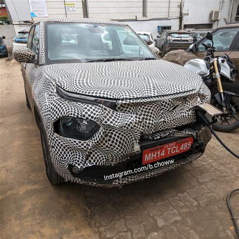 Tata Punch Ev Spotted While Charging Ahead Of Launch May Feature Front