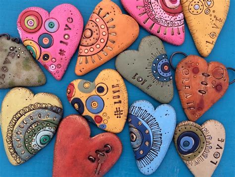 simple and colorful idea for painted hearts rocks Stone Art Painting ...