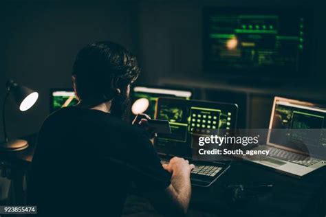 Hacker Behind Screen Photos And Premium High Res Pictures Getty Images