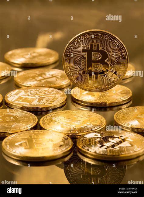 Stack Of Bitcoins With Gold Background Stock Photo Alamy