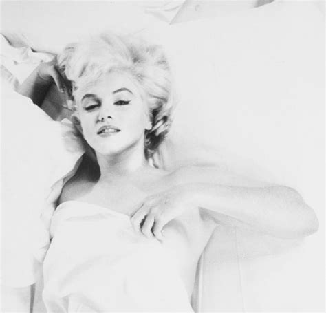 Black And White Photograph Of Marilyn Monroe Laying In Bed