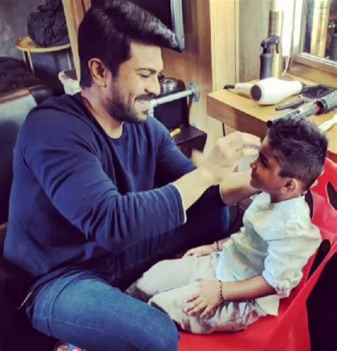 Ram Charan playing with Sneha Son