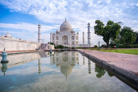 Taj Mahal Monument Reflecting In Water Of The Pool Agra India Stock