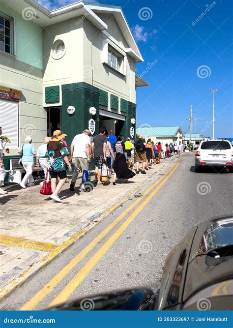 Cruise Ship Passengers Walking Along the Shops and Restaurants in the
