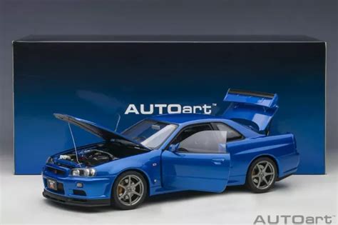 AUTOART NISSAN SKYLINE GT R R34 V Spec II Bayside Bleu 1 18 Neuf