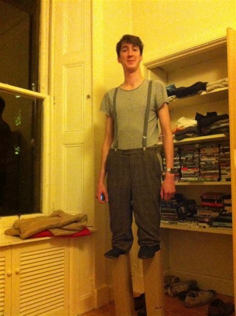 7 Foot Tall Man Dresses as Normal Guy on Stilts for Halloween