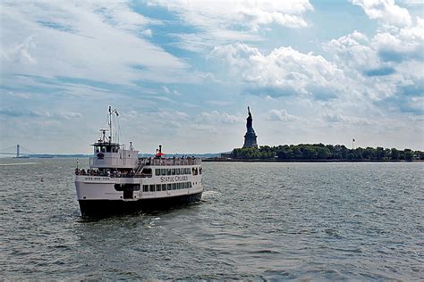 Liberty Island with Ferry Photograph by Artistic Photos