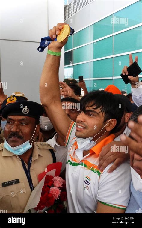 Indian Olympic Medallist Neeraj Chopra Shows The Gold Medal He Won In