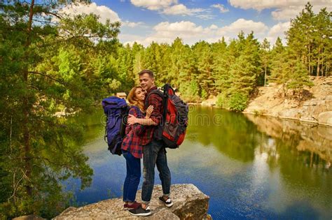 Couple Of Tourists Exploring A New Places A Handsome Couple With